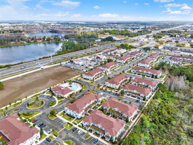 drone / aerial view with a water view