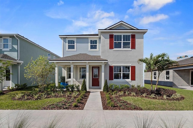 view of front of home with a front lawn