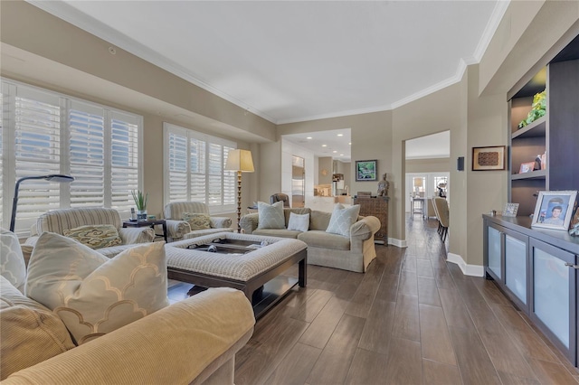 living room featuring wood-type flooring and crown molding