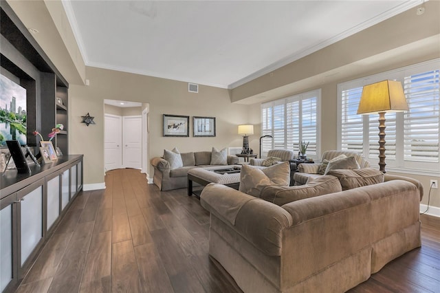 living room with dark wood-type flooring and ornamental molding