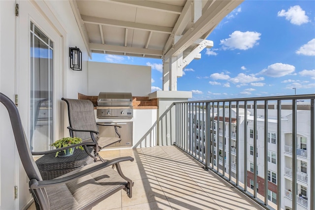 balcony featuring area for grilling