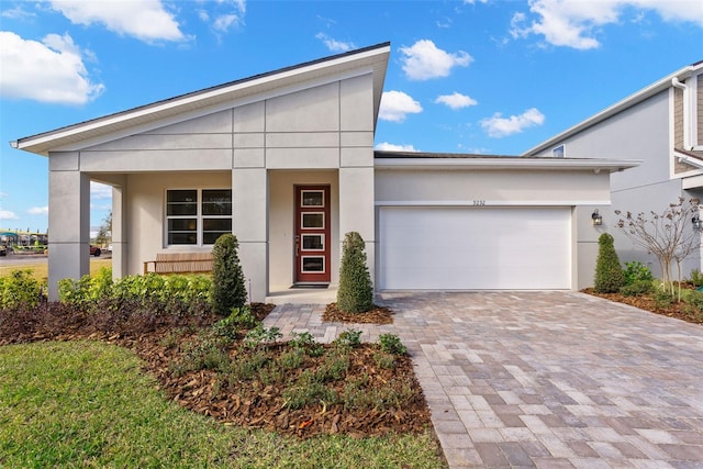 view of front of property featuring a garage