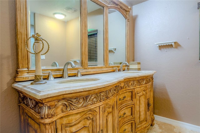 bathroom featuring vanity and tile patterned floors