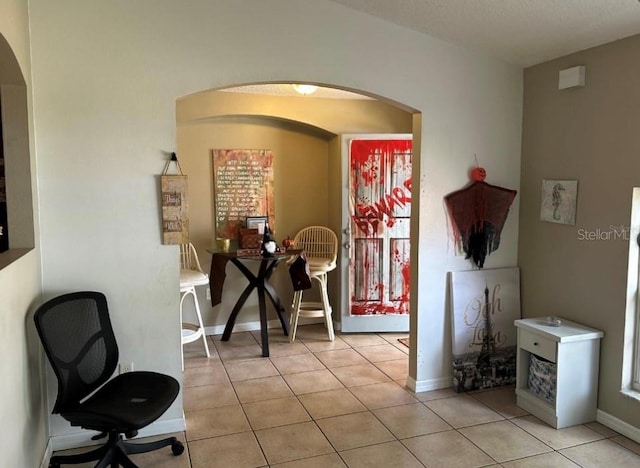 interior space with light tile patterned floors