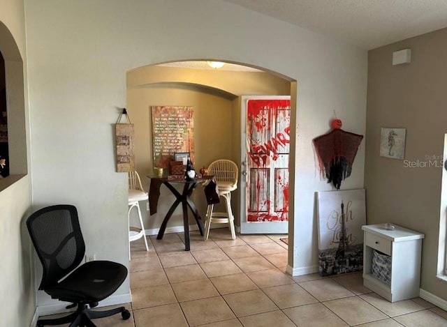 dining room featuring light tile patterned flooring