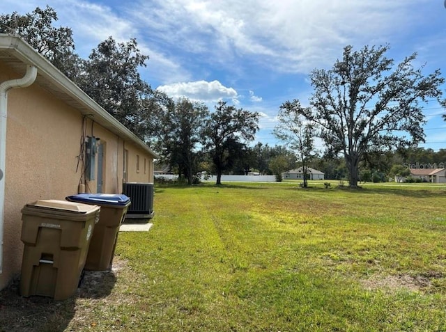 view of yard featuring central AC