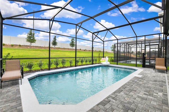 3373 Lilac Way, Davenport, FL 33897 - view of pool with a yard, glass enclosure, and a patio area