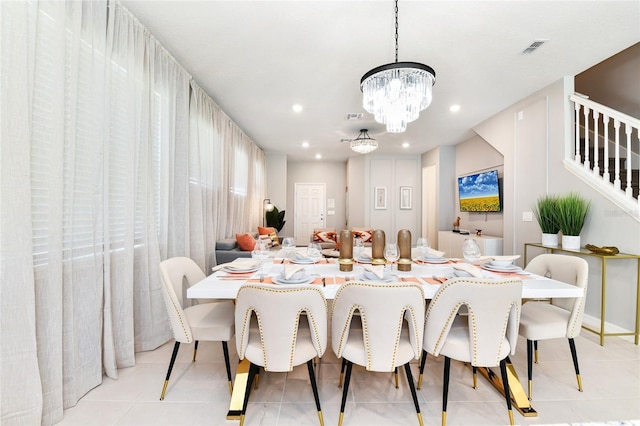 3373 Lilac Way, Davenport, FL 33897 - tiled dining space with a notable chandelier