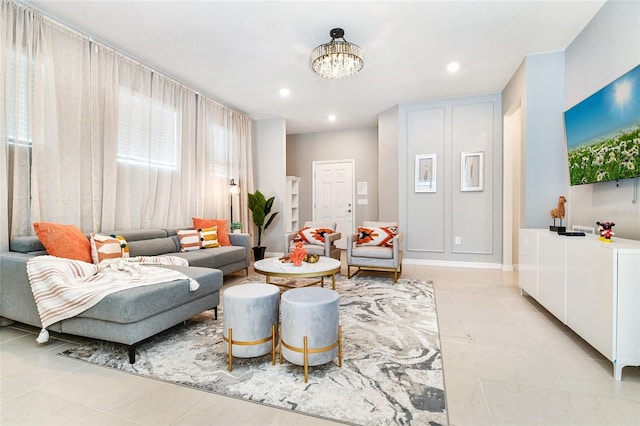 3373 Lilac Way, Davenport, FL 33897 - tiled living room featuring a chandelier