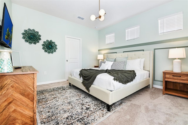 3373 Lilac Way, Davenport, FL 33897 - bedroom featuring carpet and an inviting chandelier