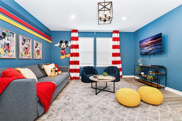 3373 Lilac Way, Davenport, FL 33897 - living room featuring wood-type flooring and a notable chandelier