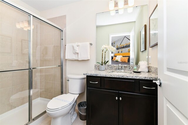 3373 Lilac Way, Davenport, FL 33897 - bathroom with vanity, toilet, and an enclosed shower