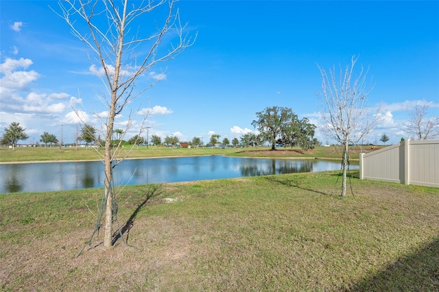 view of water feature with fence