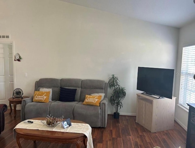 living room with dark wood-type flooring