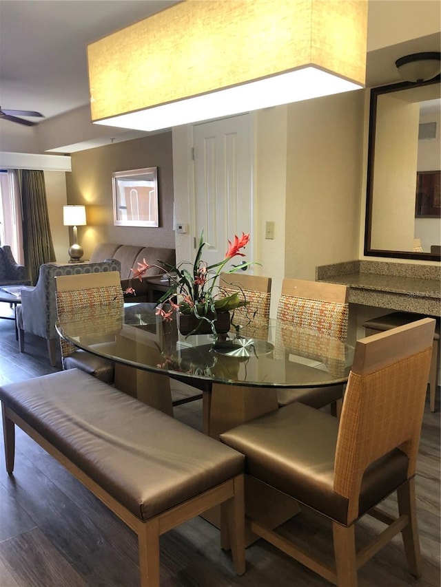 dining room with visible vents and wood finished floors