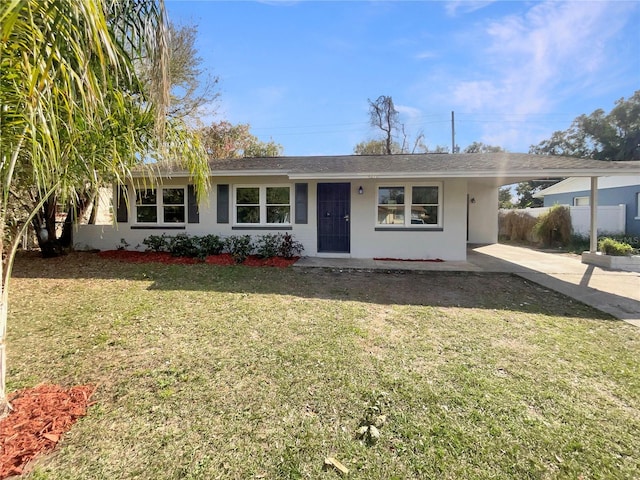 4270 Solomon Dr, Orlando, FL 32811 - single story home featuring a front lawn and a carport