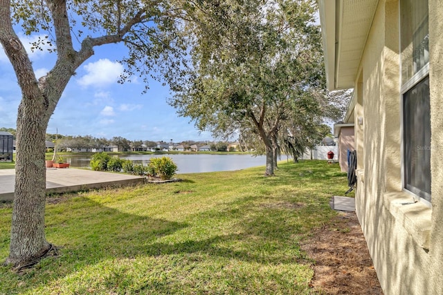 view of yard with a water view