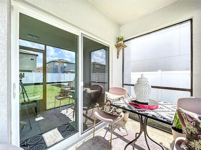 sunroom featuring visible vents