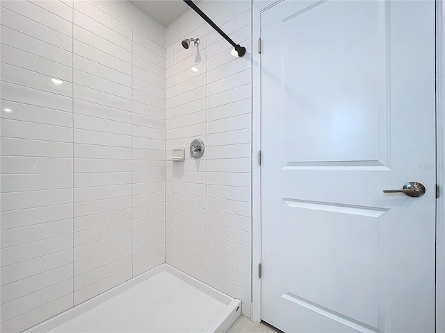 bathroom with a stall shower