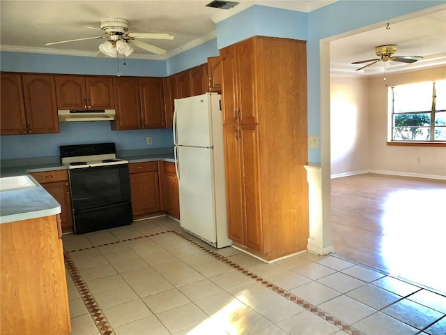 kitchen featuring range with electric stovetop, light tile patterned flooring, white fridge, ceiling fan, and crown molding