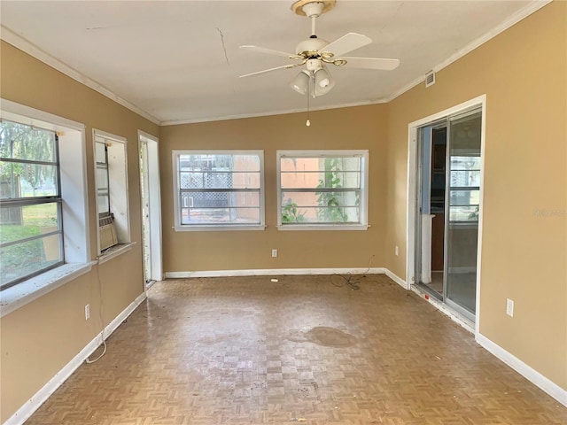 unfurnished sunroom with ceiling fan