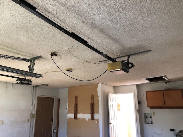 garage featuring a garage door opener