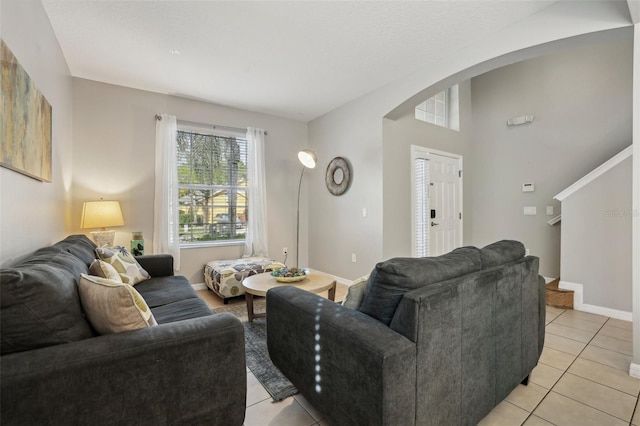 living room with light tile patterned floors