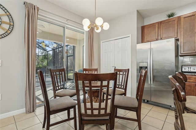 tiled dining area with an inviting chandelier