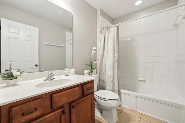 full bathroom featuring toilet, tile patterned flooring, shower / tub combo with curtain, and vanity