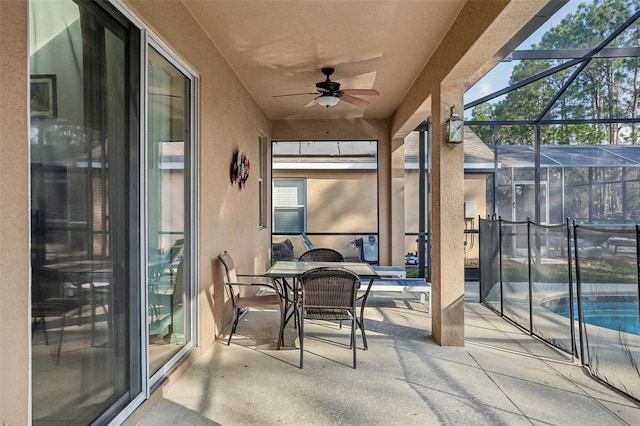 sunroom / solarium with ceiling fan