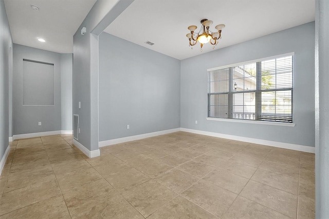 unfurnished room with an inviting chandelier, baseboards, light tile patterned floors, and visible vents