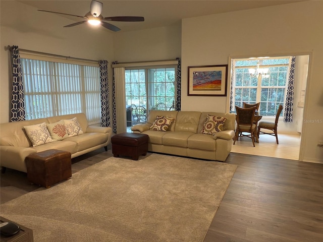 living room with hardwood / wood-style floors and ceiling fan