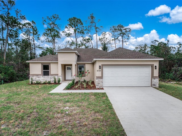 view of front of house with driveway, stone siding, an attached garage, a front lawn, and stucco siding