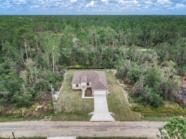 bird's eye view with a view of trees