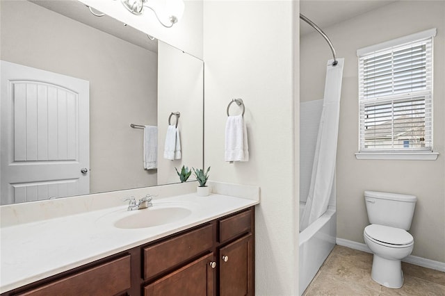 bathroom with toilet, vanity, baseboards, tile patterned floors, and shower / bath combination with curtain