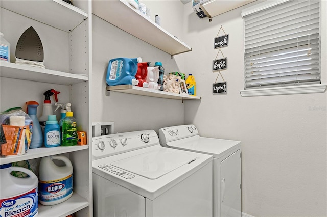 laundry area with laundry area and separate washer and dryer