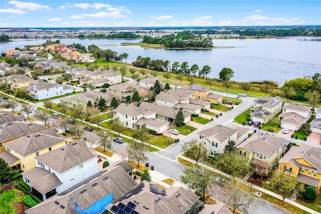 aerial view featuring a water view and a residential view