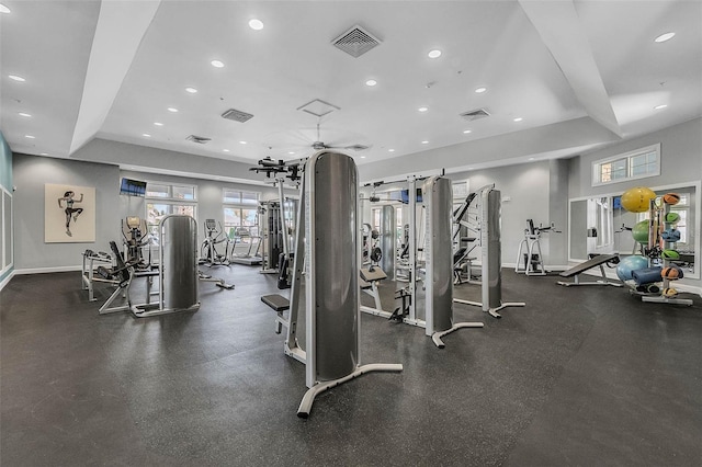 workout area featuring recessed lighting, visible vents, and baseboards