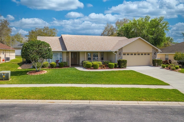 ranch-style home with a garage and a front lawn