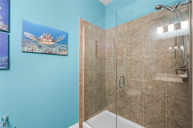 full bath featuring a shower stall