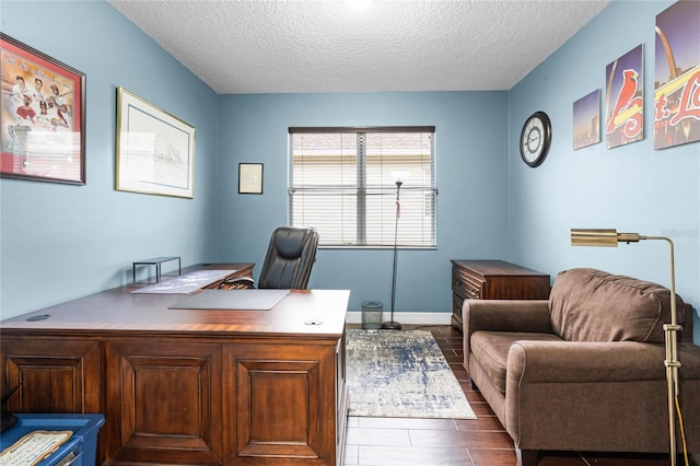 office featuring a textured ceiling