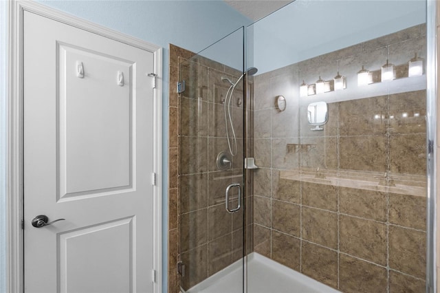 full bathroom with tiled shower
