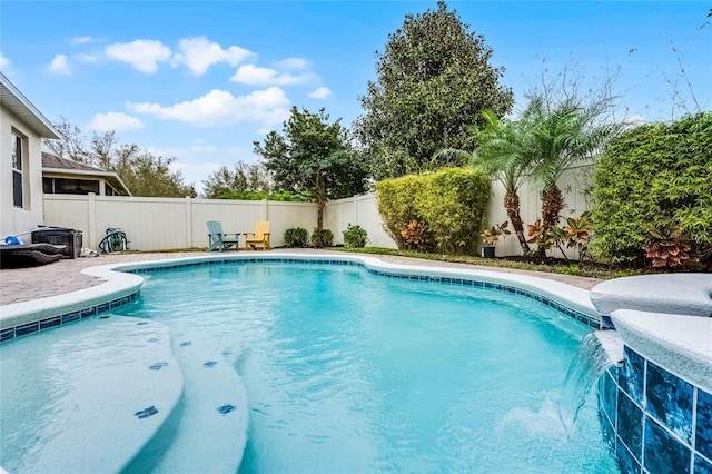 view of pool featuring a fenced in pool and a fenced backyard