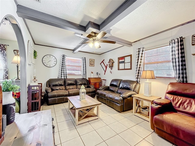 tiled living room featuring beam ceiling, a textured ceiling, ceiling fan, crown molding, and coffered ceiling