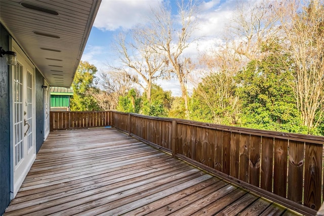 wooden deck featuring french doors