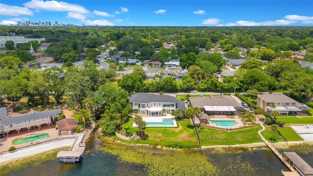 bird's eye view featuring a water view and a residential view