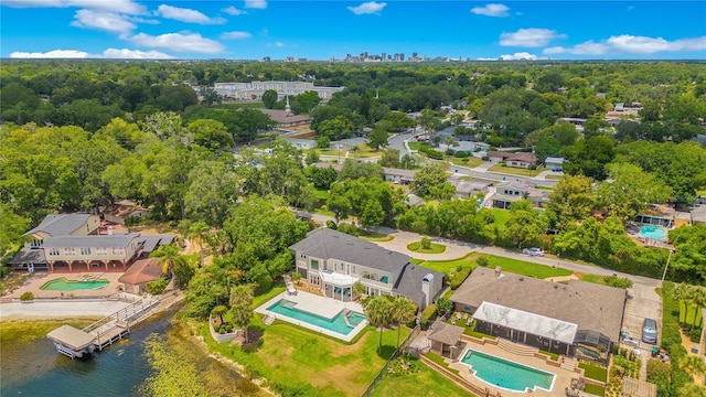 bird's eye view with a water view and a residential view