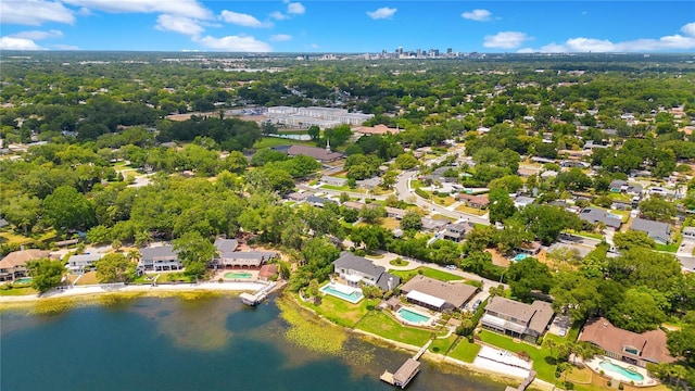 birds eye view of property featuring a residential view and a water view