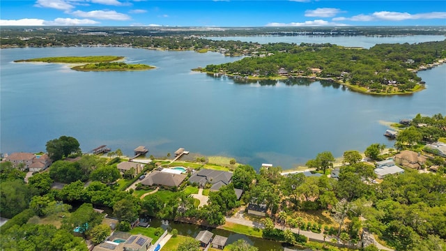 birds eye view of property featuring a residential view and a water view