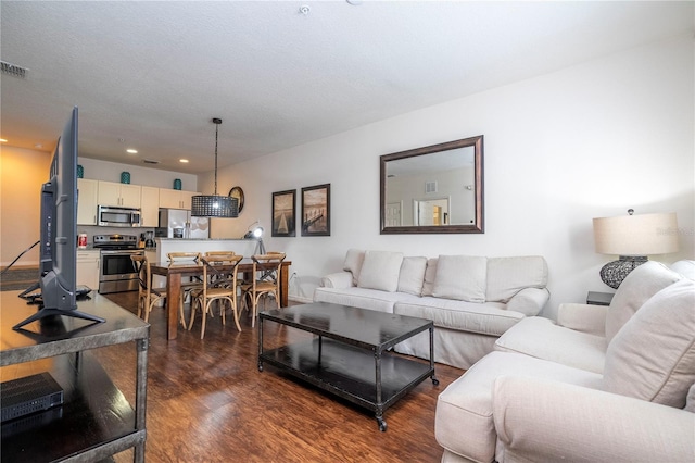 living room with dark wood-type flooring